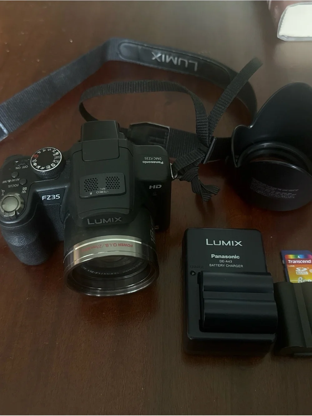 Panasonic Lumix FZ35 Digital Camera in Black with Charger and Lens Hood